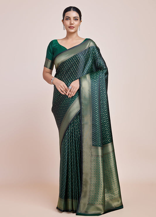 Monjolika Fashion Glamour And Tradition With This Zari Woven Dark Green Color Banarasi Satin Silk Saree