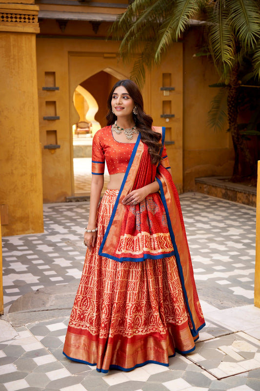 Lorenvalley Fashion Rust Dola Silk Batik Print with Zari Weaving Work Lehenga Choli with Dupatta