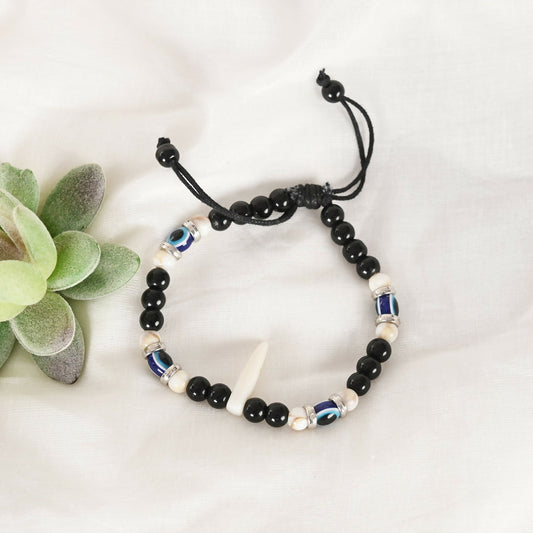 NVR Women & Men Black Evil Eye Rakhi With Roli Chawal