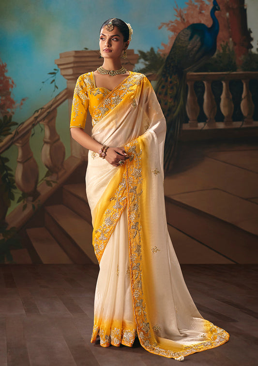 Monjolika Fashion Cream Fancy Fabric Saree With Embroidered Work