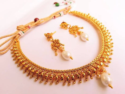 Amazing metallic Necklace Set with pearl drops