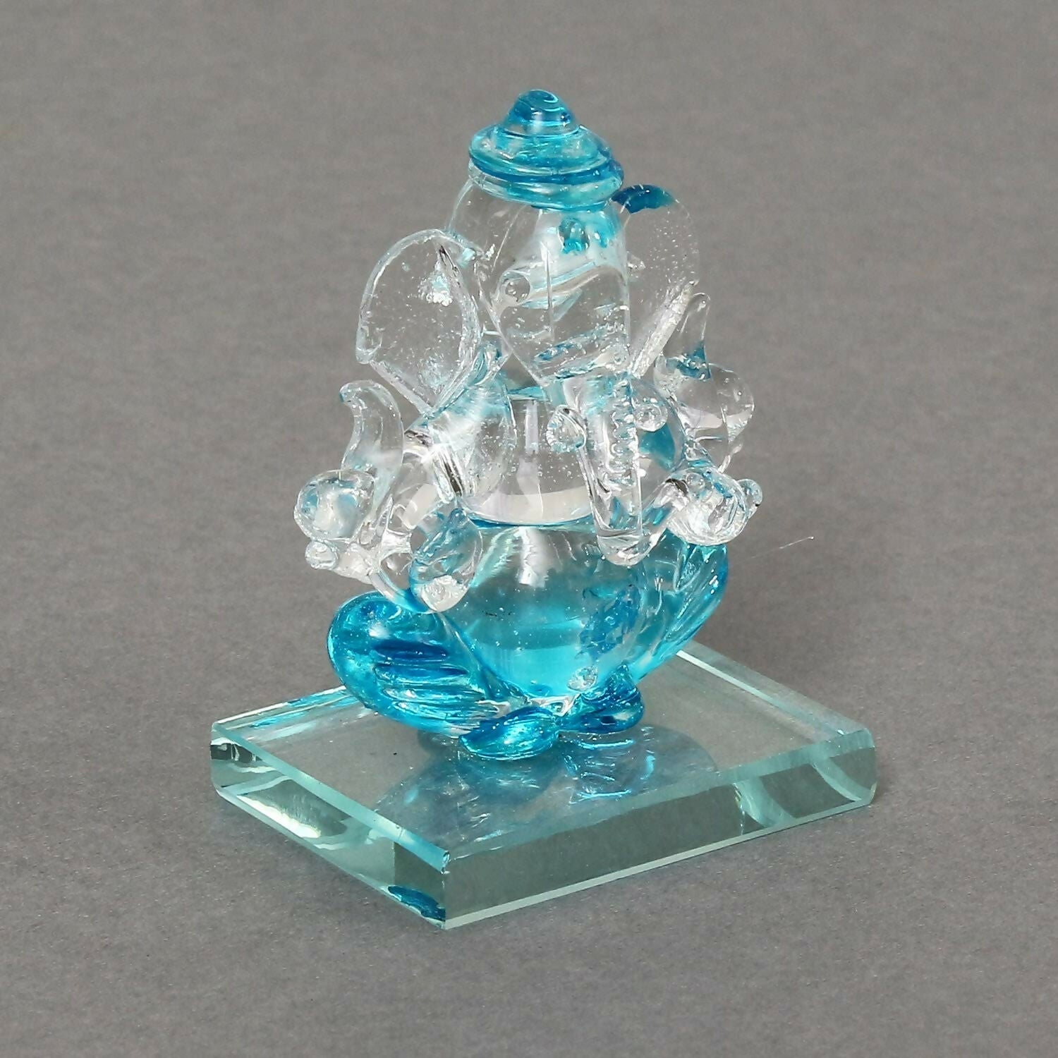 eCraftIndia SkyBlue and Transparent Double Sided Crystal Car Ganesha Showpiece - Grab2buy