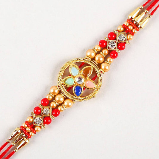 Flower Design Kundan Rakhi and Kaju Rolls Box