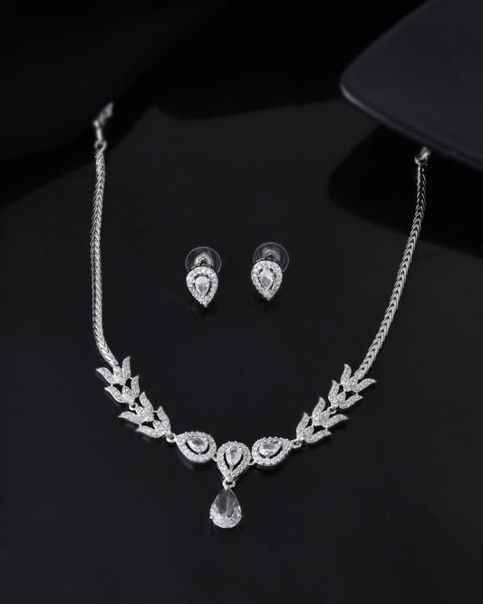 Jewels Nest Silver-Plated American Diamond (Ad) Necklace Set With Teardrop Pendant & Matching Earrings