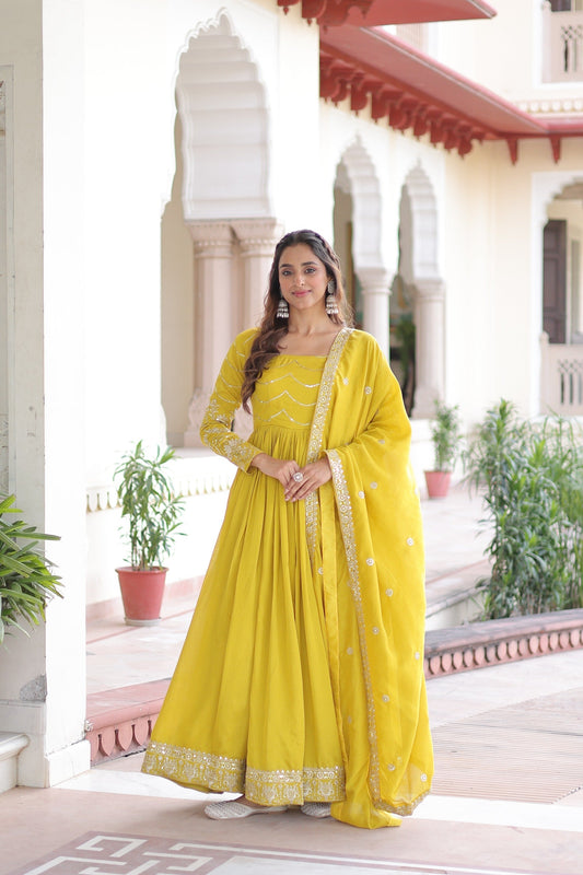 Prazu Fashion Yellow Vichitra Silk Rich Sequins Embroidered Work Gown With Dupatta