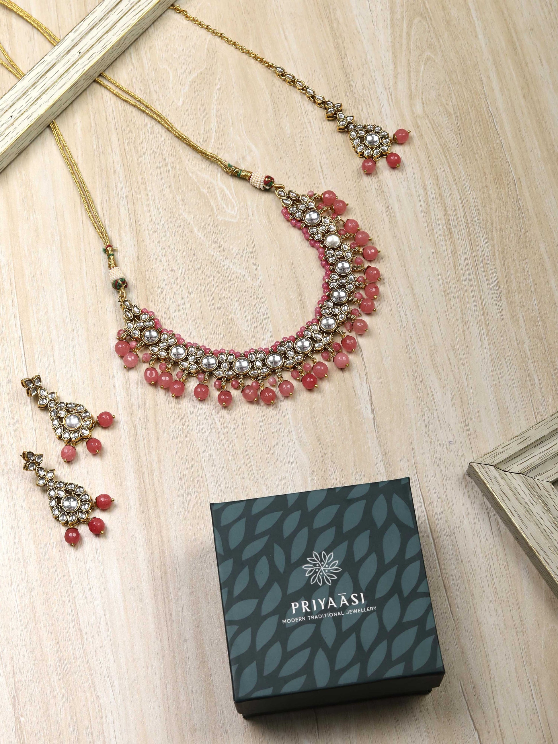 Priyaasi Women Pink Beads Pearls Kundan Gold Plated Jewellery Set with Maang Tikka - Grab2buy