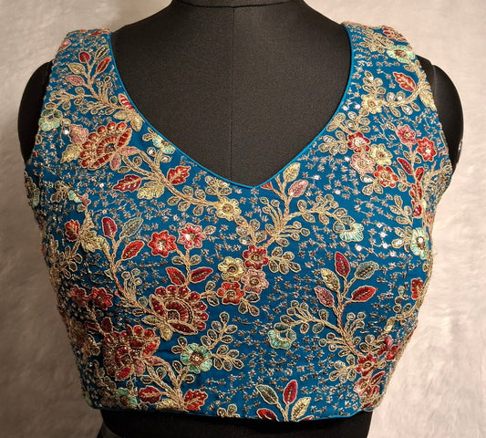 Kia Fashions Turquoise Blue Georgette Multi Color Emb & Sqn Readymade Blouse