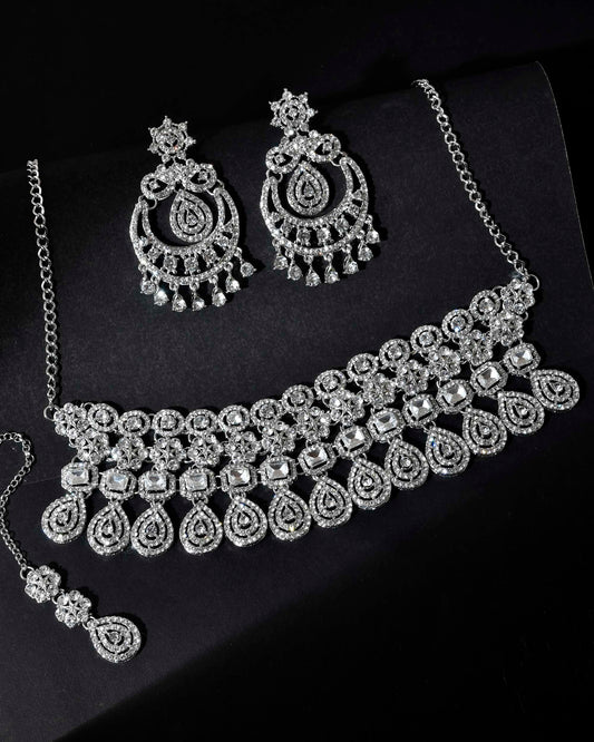 VOJ Silver Plated AD Studded Necklace With Earrings And Mangtikka Set | Grab2Buy