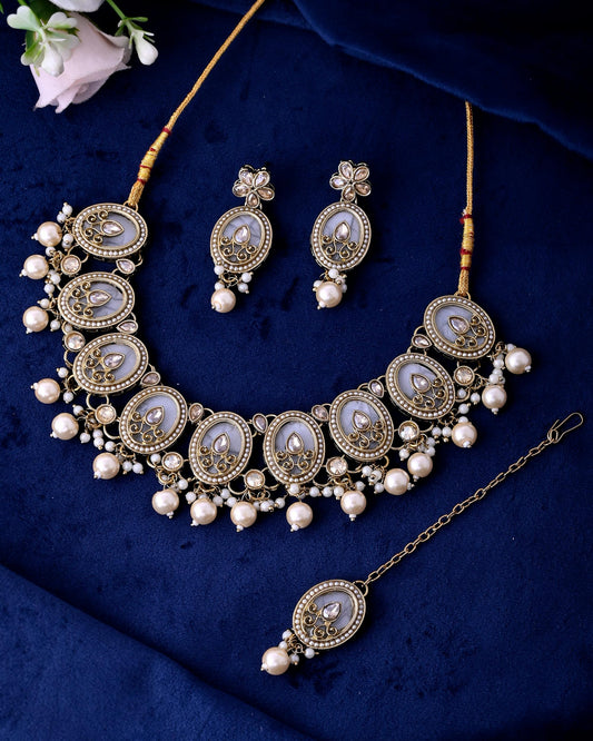 VOJ Gold-Polished Kundan Stone Studded White Necklace With Maang Tikka And Earrings Set