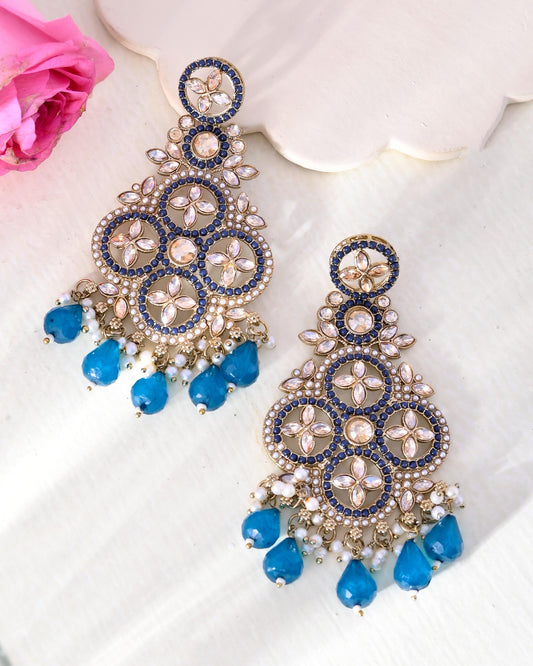VOJ Blue Stone Studded Gold-Polished Crescent Shaped Earrings VOJ (Valley Of Jewellery)