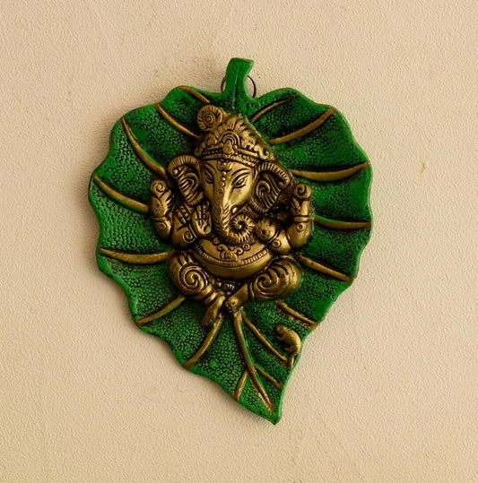 Grab2Buy Metal Golden Lord Ganesha On Green Leaf Wall Hanging Sculpture
