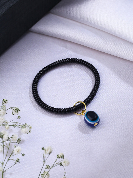 NVR Women & Men Black Evil Eye Spring Ring Rakhi With Roli Chawal