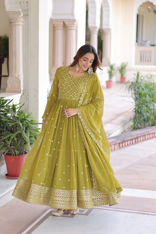 Evanik Mehendi Faux Georgette with Rich Sequins & Zari Embroidered work Gown