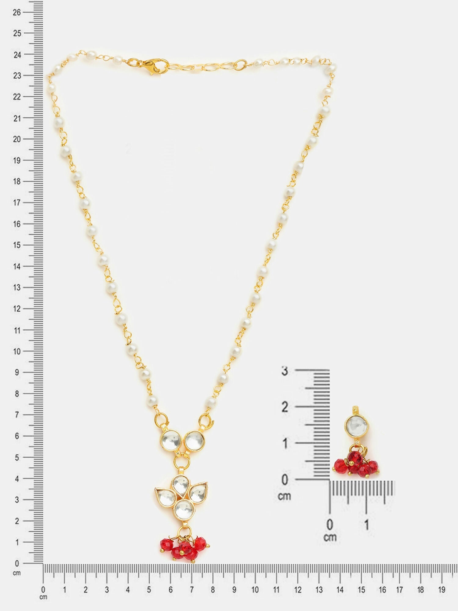 Ruby Raang Kundan Studded And Pearl Beaded Jewellery Set