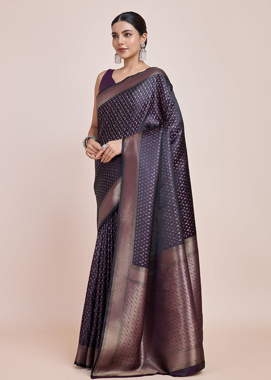 Monjolika Fashion Glamour And Tradition With This Zari Woven Darl Purple Color Banarasi Satin Silk Saree