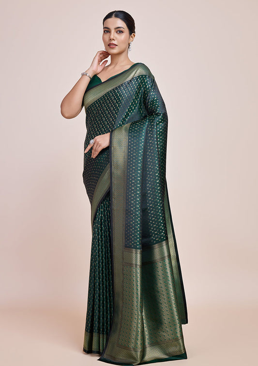 Monjolika Fashion Glamour And Tradition With This Zari Woven Dark Green Color Banarasi Satin Silk Saree