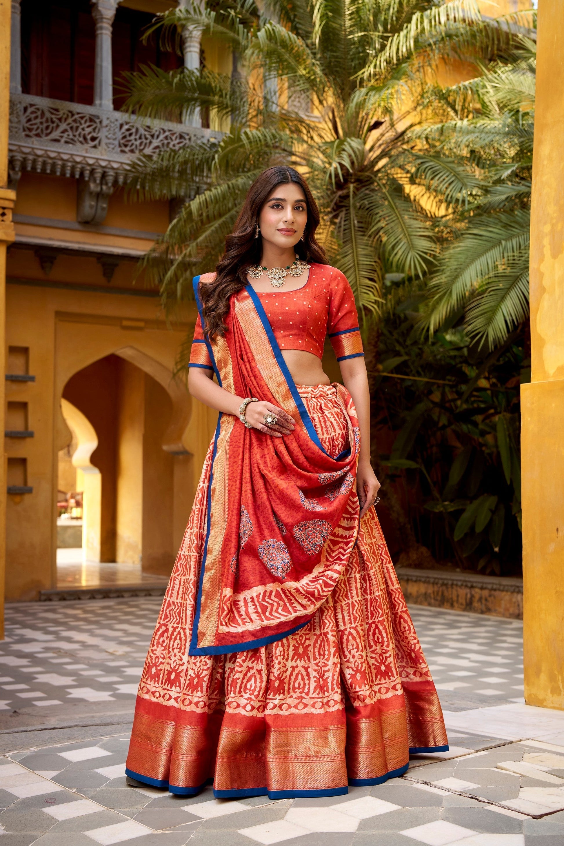Lorenvalley Fashion Rust Dola Silk Batik Print with Zari Weaving Work Lehenga Choli with Dupatta 