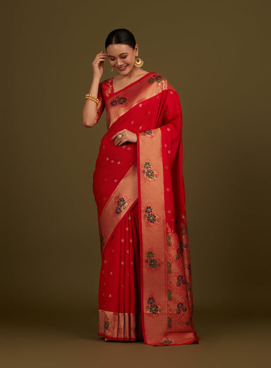 Monjolika Fashion Red Woven Silk Blend SareeWith Zari Work & Floral Motifs