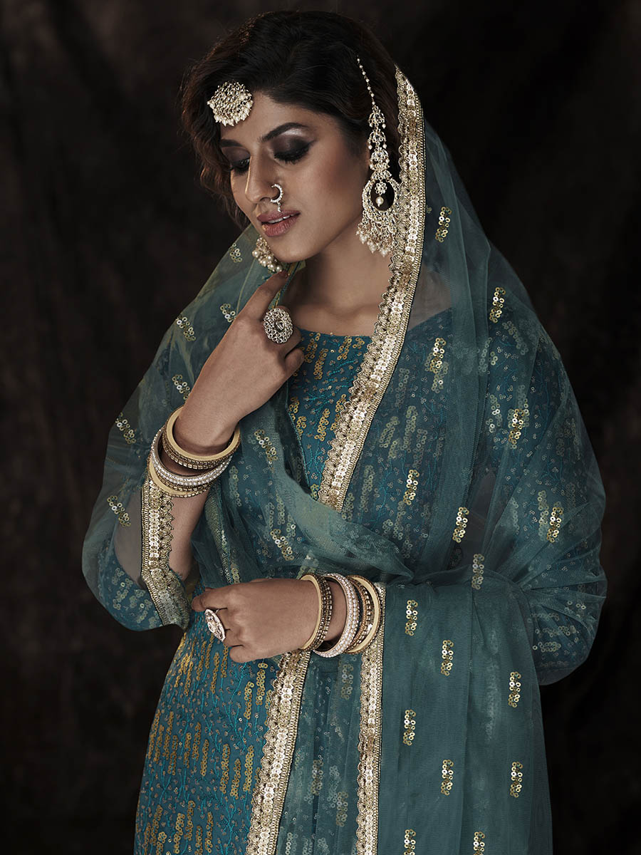 Myra Dark Firozi Net Embroidered Sharara Suit 