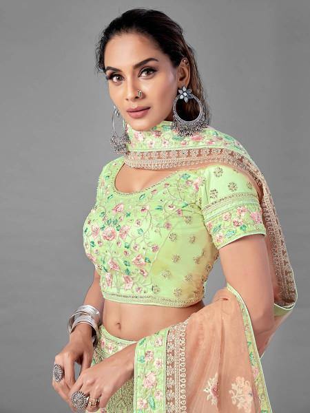 Myra Bridal Lehenga in Pista Heavy Embroidered Soft Net