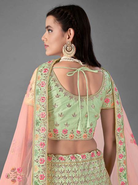 Myra Beautiful Pista Heavy Embroidered Art Silk Bridal Lehenga