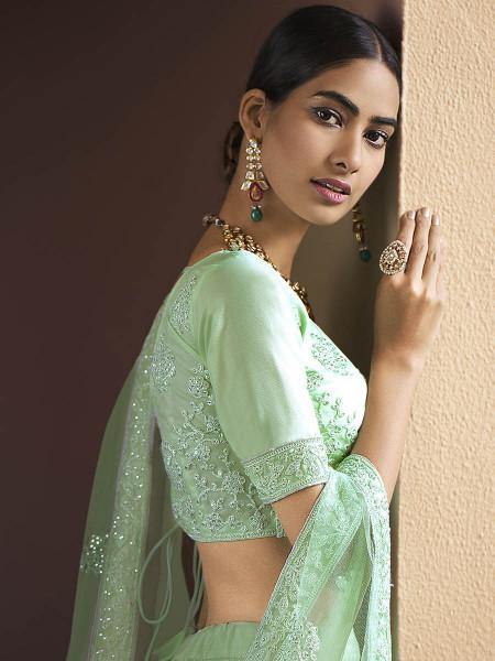 Myra Green Heavy Embroidered Soft Net Bridal Lehenga 
