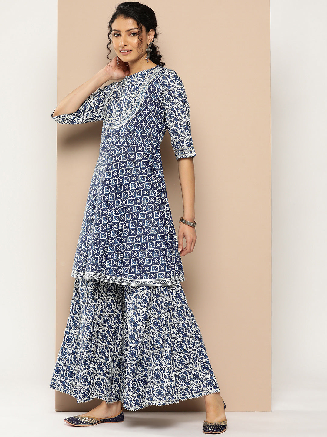 KSUT (House of Varanga) Indigo And White Floral Printed Flared Kurta Sharara Set
