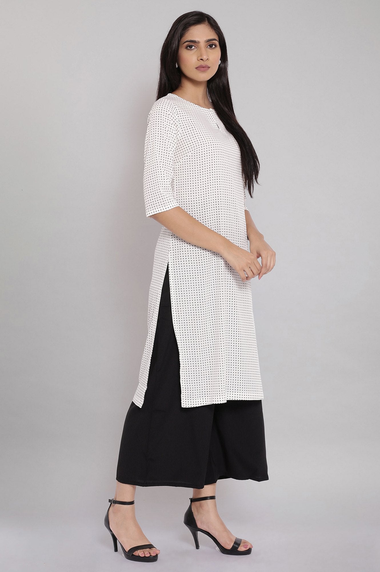 W for Woman Ecru Printed kurta With Black Parallel Pants