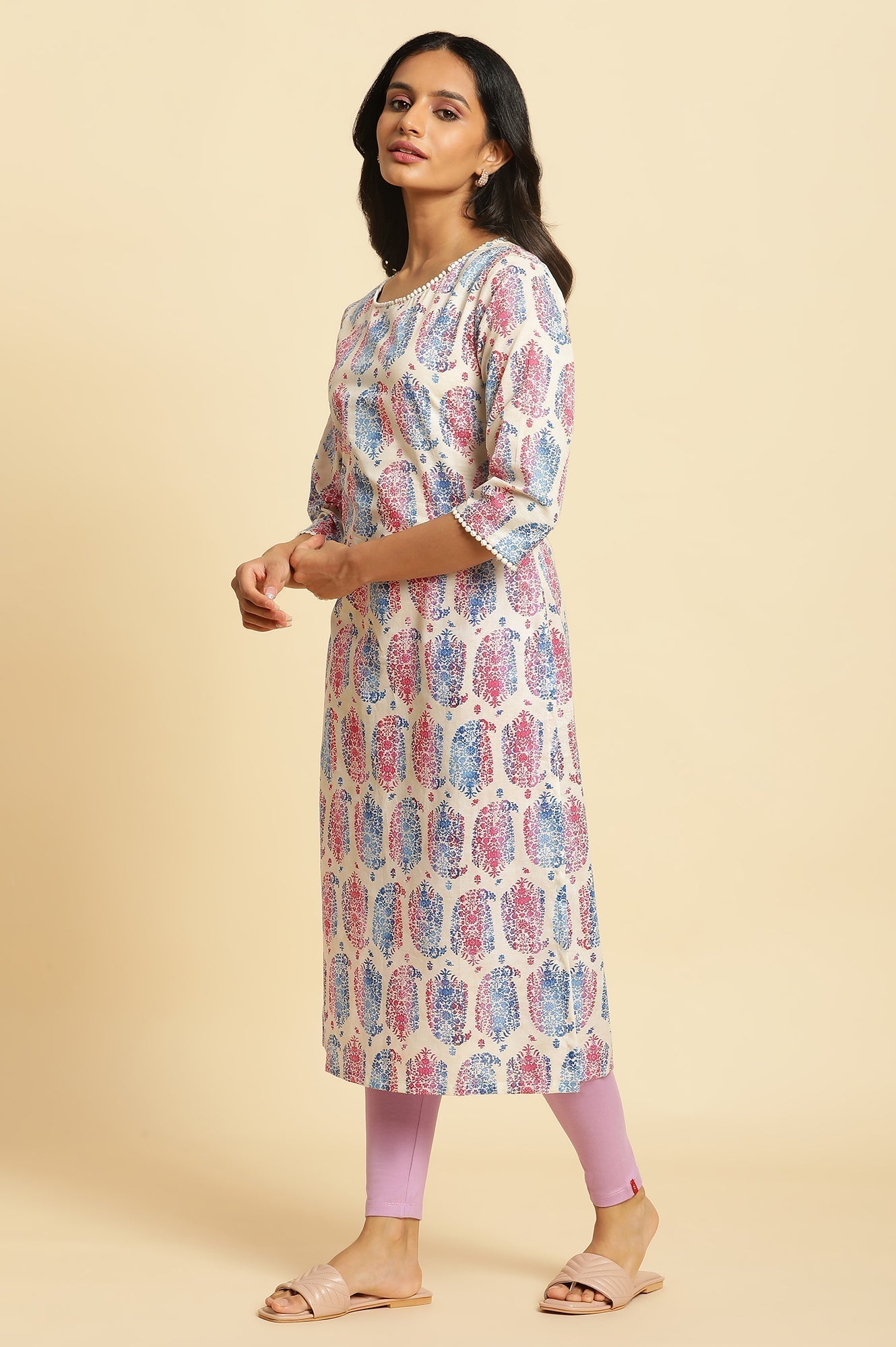 W for Woman Ecru Straight Kurta in Bright Multi-coloured Prints
