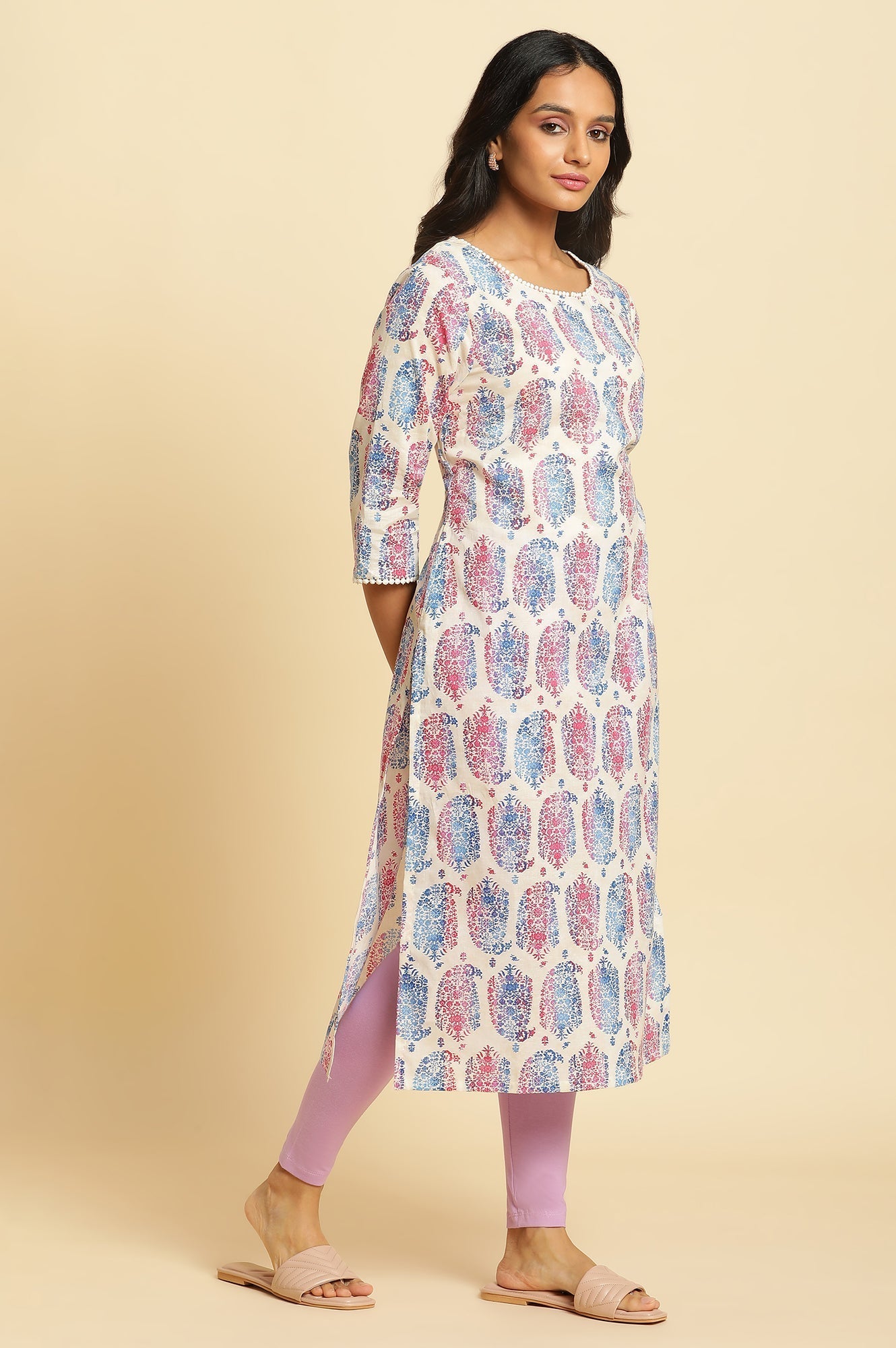 W for Woman Ecru Straight Kurta in Bright Multi-coloured Prints