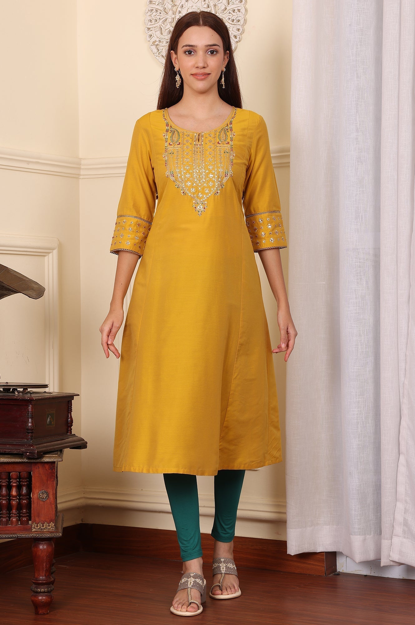 W for Woman Mustard Yellow Solid Flared Kurta With Embroidered Yoke