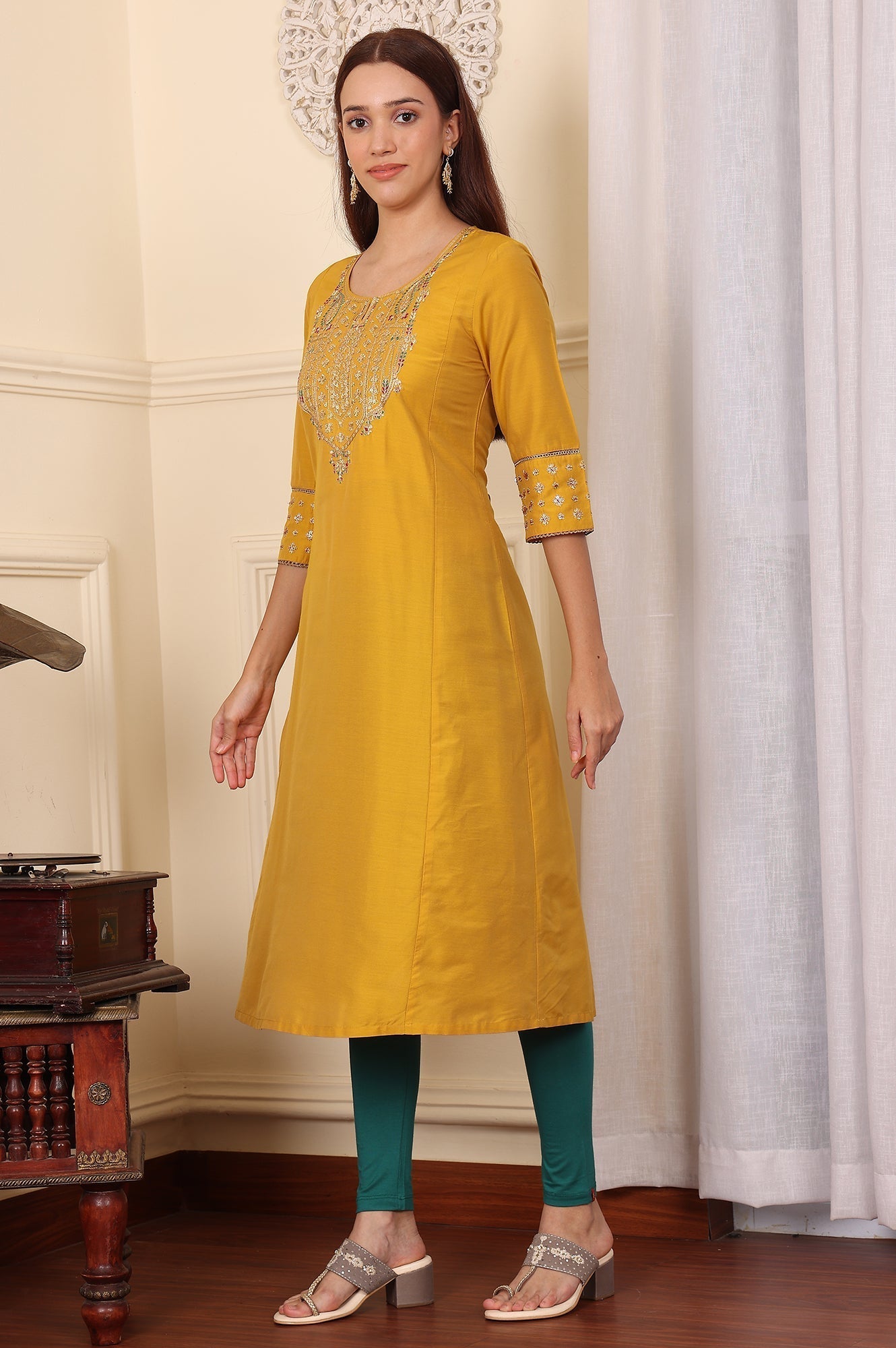W for Woman Mustard Yellow Solid Flared Kurta With Embroidered Yoke