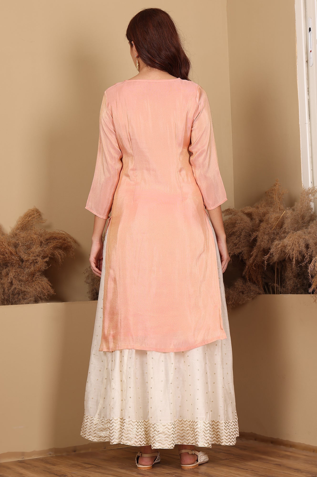 W for Woman Peach Solid Straight Tissue Kurta With Embroidered Neck