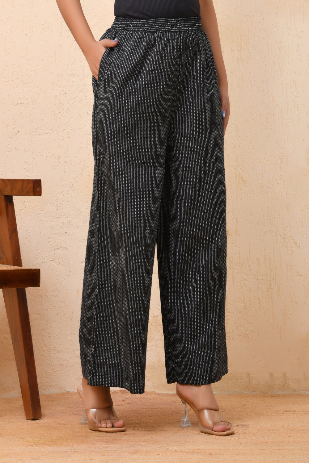 Vaasva Women Black Kantha Flared Pants 
