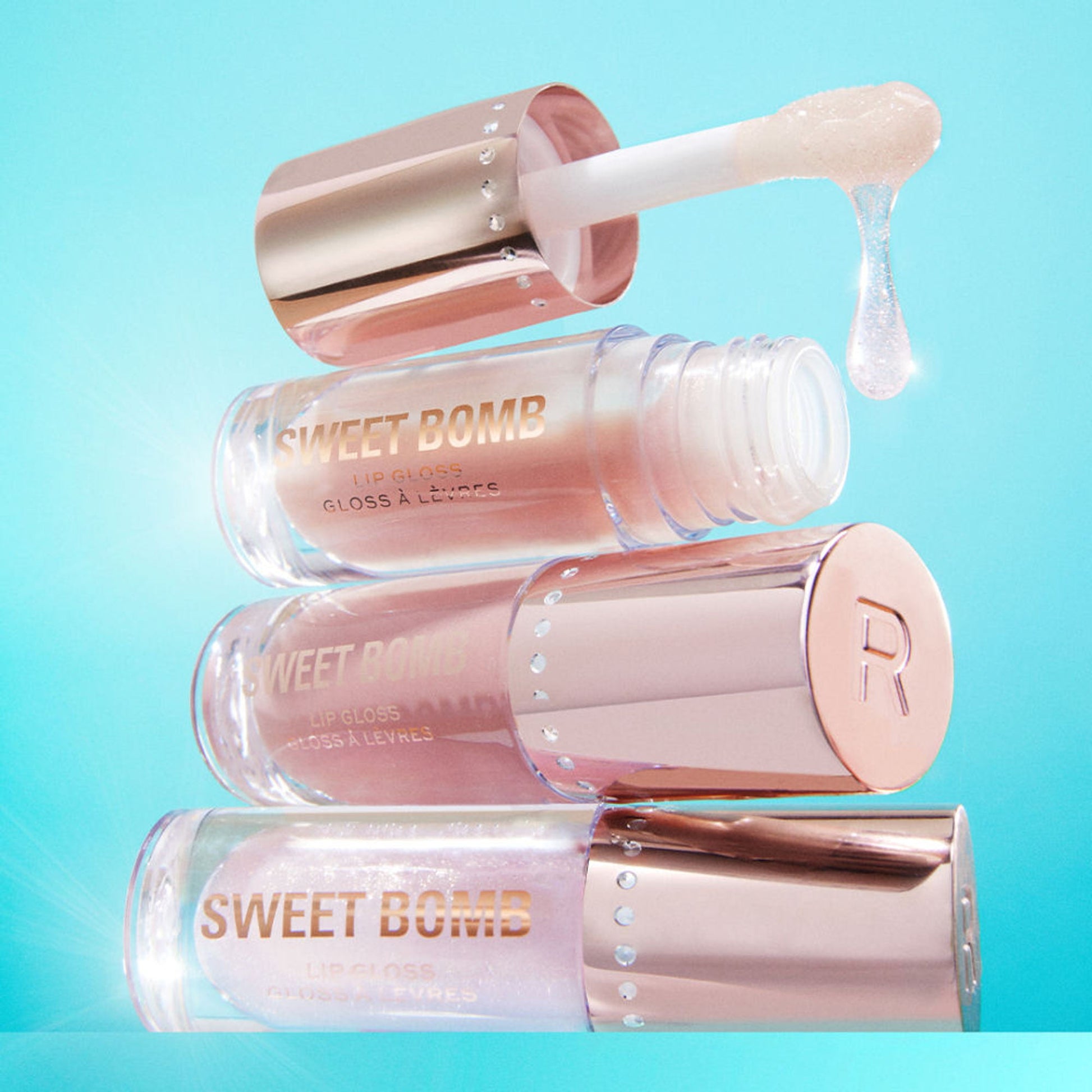 Makeup Revolution Y2K Baby Sweet Bomb Lip Gloss - Candyfloss Pink Glitter