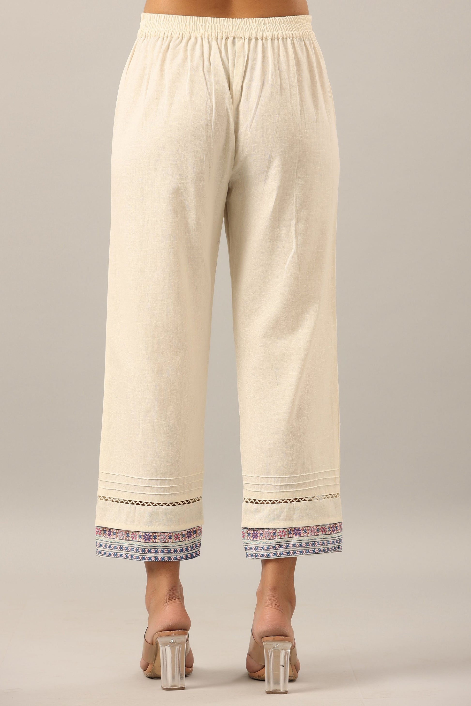 Juniper Women's Off-White Solid Cotton Flex Pants With Printed Hem, Pintucks & Lace Work