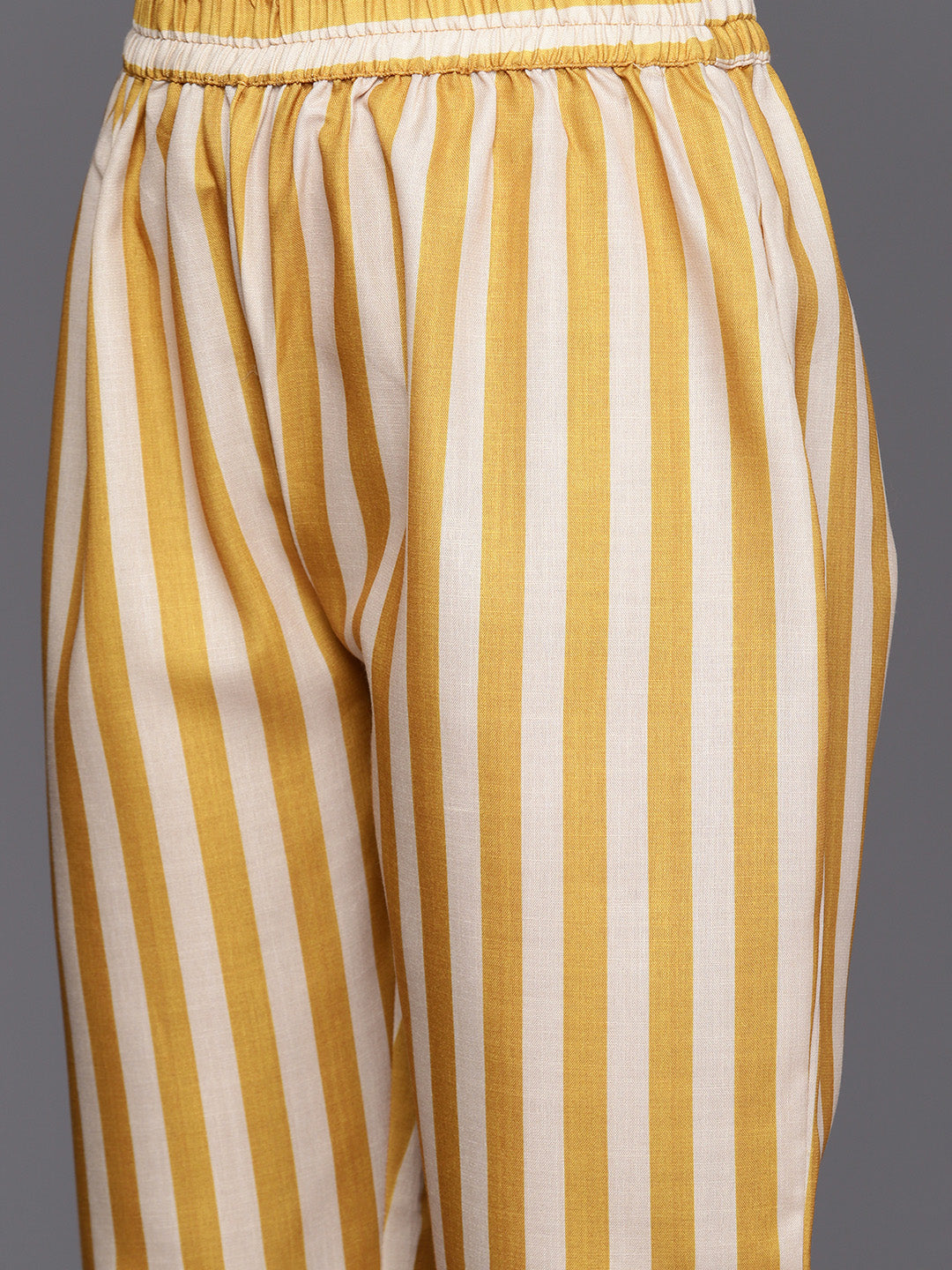KSUT (House of Varanga) Mustard Digital Printed Kurta With V Neckline Paired With Straight Trouser