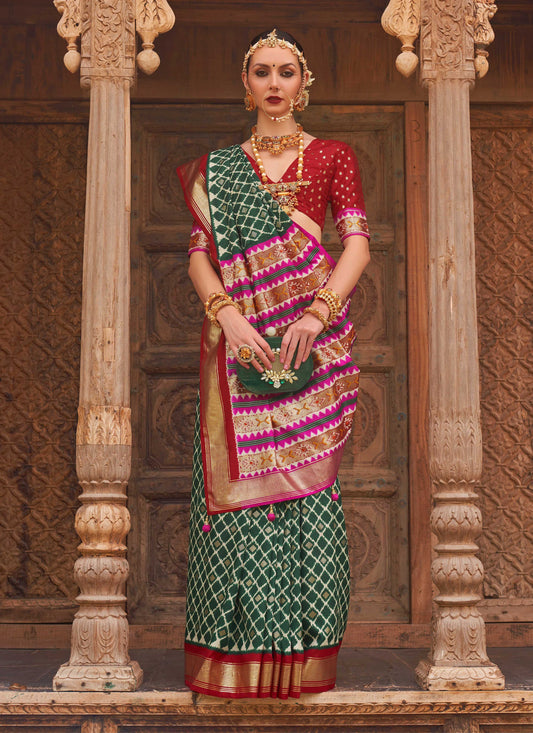 Monjolika Fashion Dark Green Color Patola Silk Weaving Work Saree With Blouse