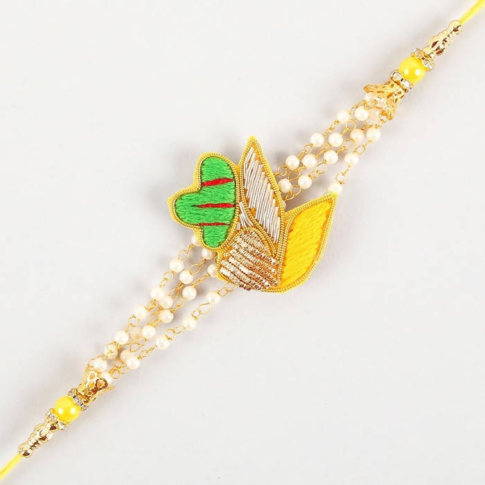 Meenakari Glimming Rakhi & Kaju Rolls Box