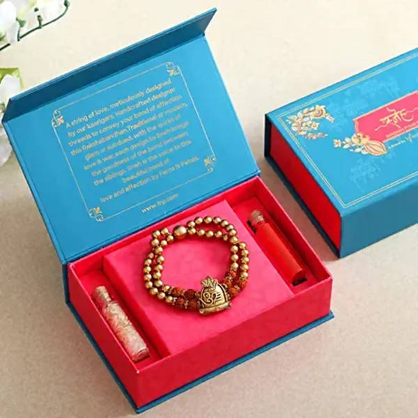 Om Pearl Bracelet Rakhi & Cashew Jar