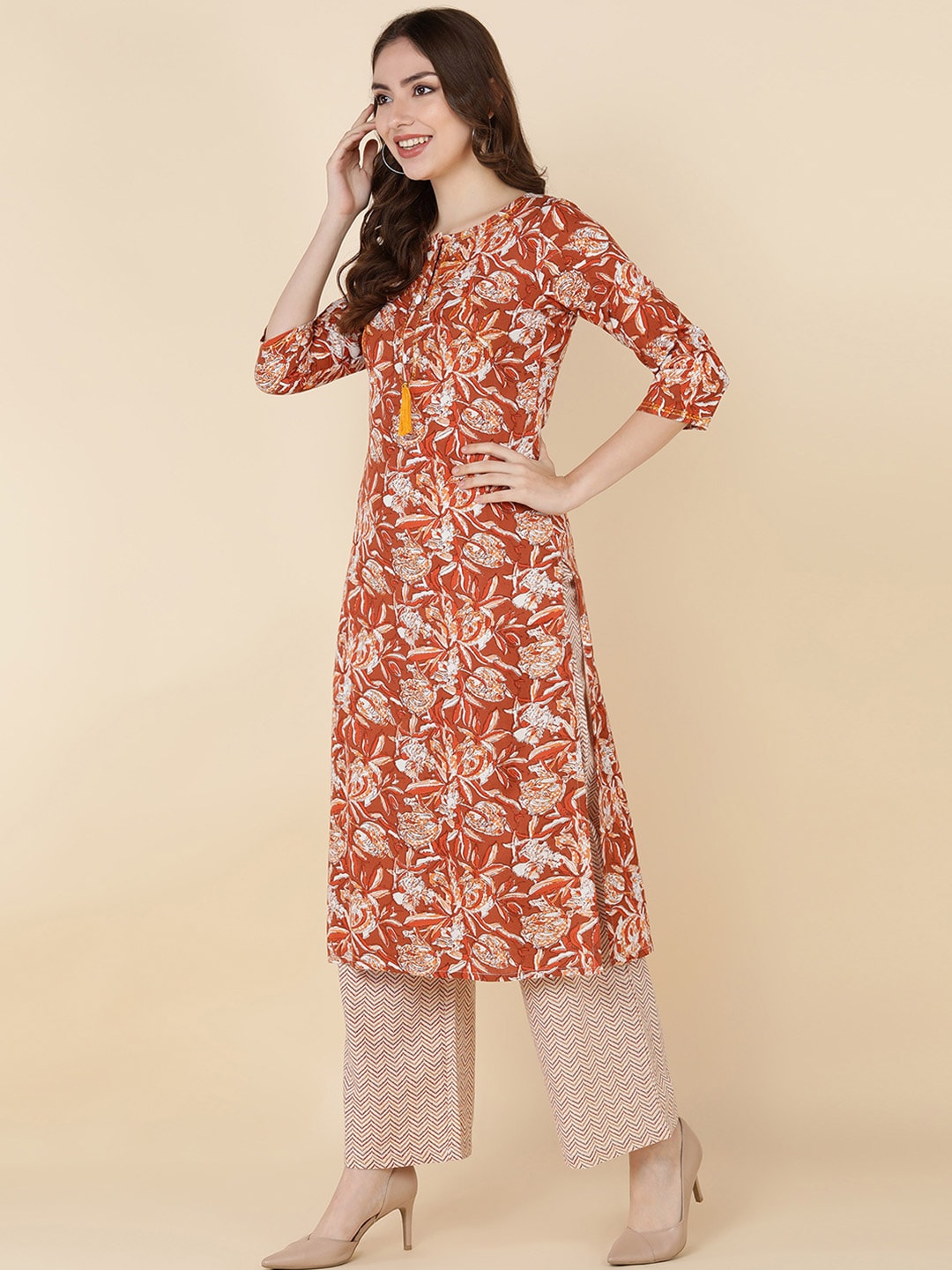 HERE&NOW Women Brown Floral Printed Sequinned Kurta with Trousers