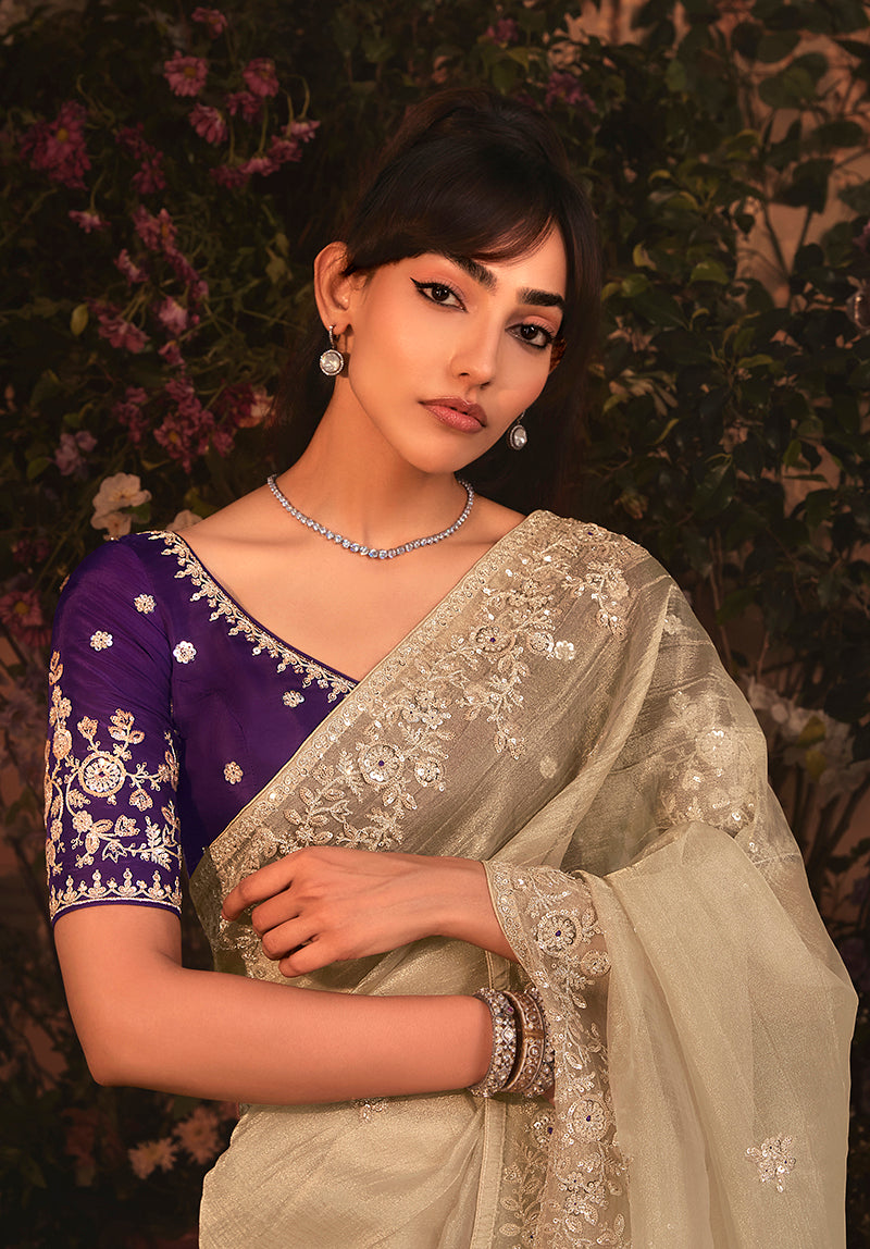 Monjolika Fashion Designer Beige Tissue Organza Saree With All Over Butta Work & Heavy Stone Embellished Border