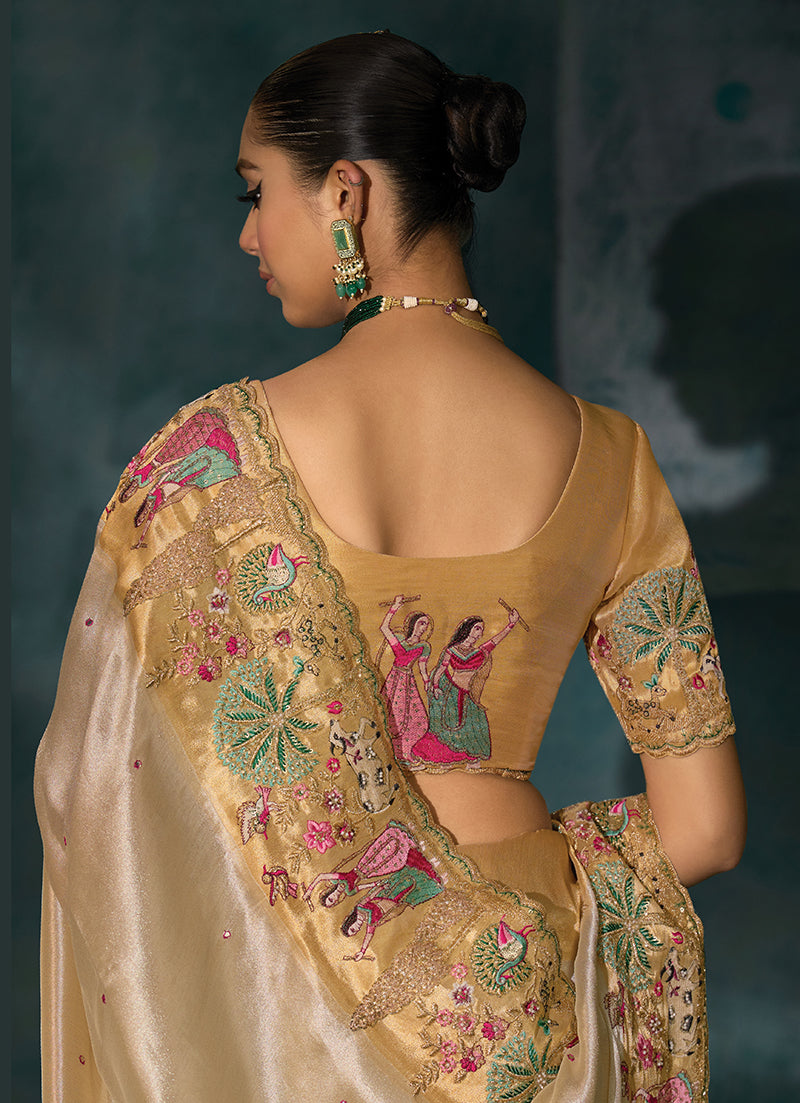 Monjolika Fashion Cream Color Silk Blend Cutdana Moti And Mirror Heavy Work Beautiful Border Saree