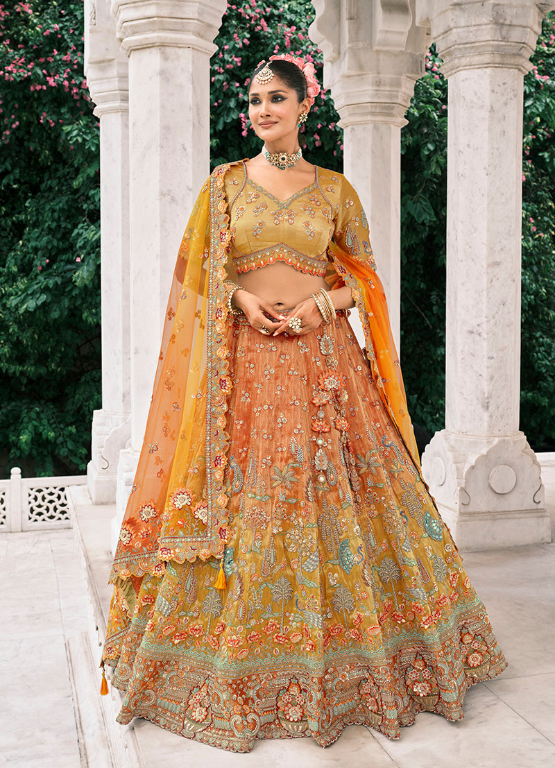 Monjolika Fashion Rust Orange And Mustard Yellow Silk Bridal With Embroidery And Sequins Work Lehenga