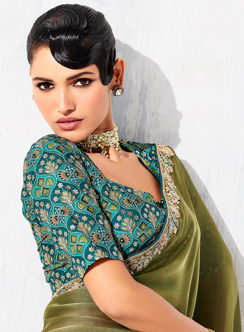 Monjolika Fashion Olive Green Fancy Fabric Embroidered Contemporary Saree