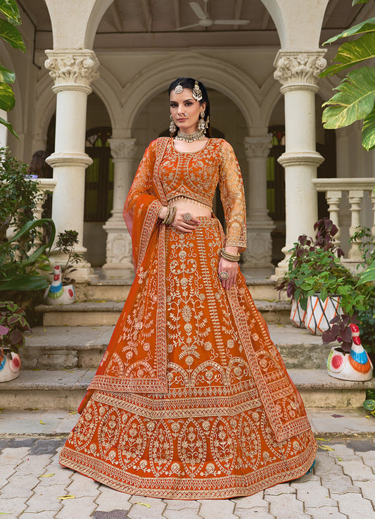 Monjolika Fashion Orange Butterfly Net Embroidered Work Stunning Lehenga For Wedding Season