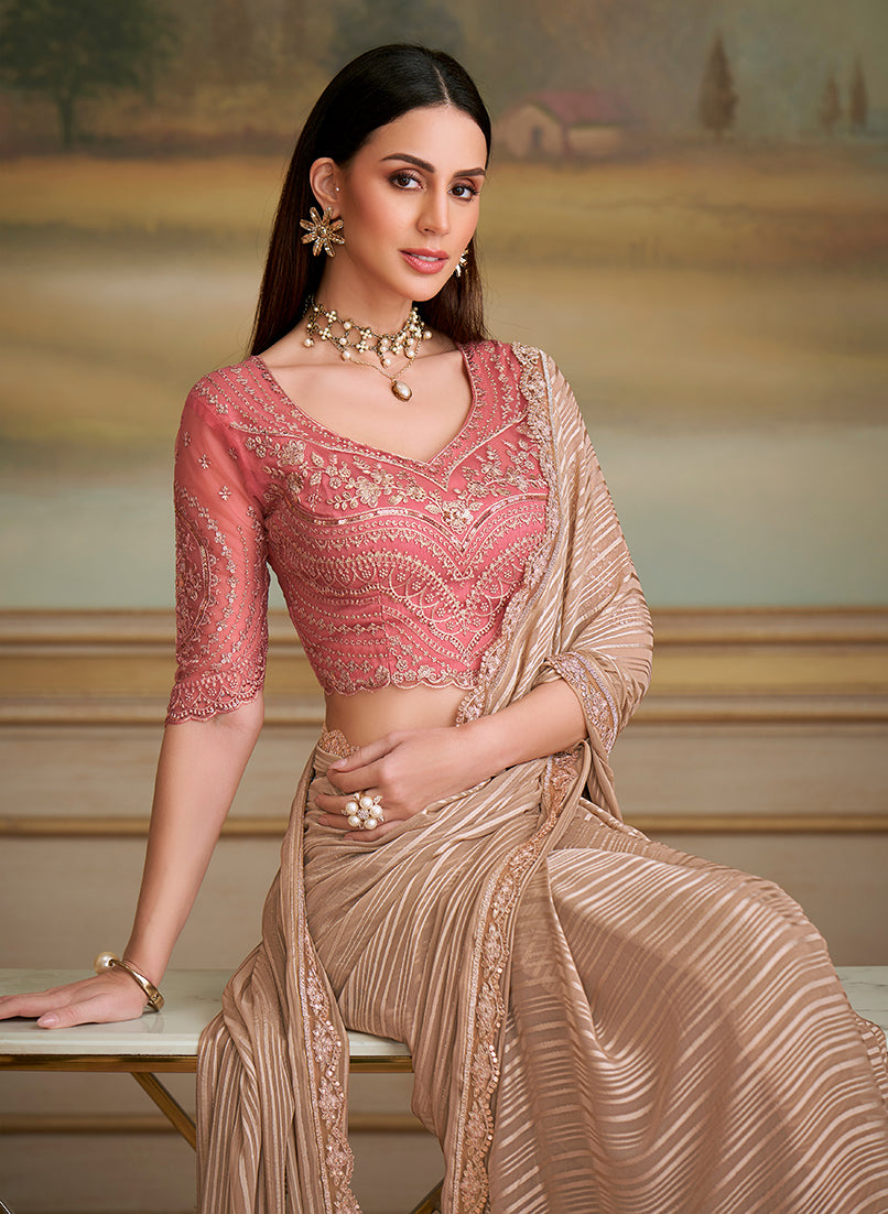 Monjolika Fashion Chiku Gold Satin Georgette Embroidered Border Party Trendy Saree