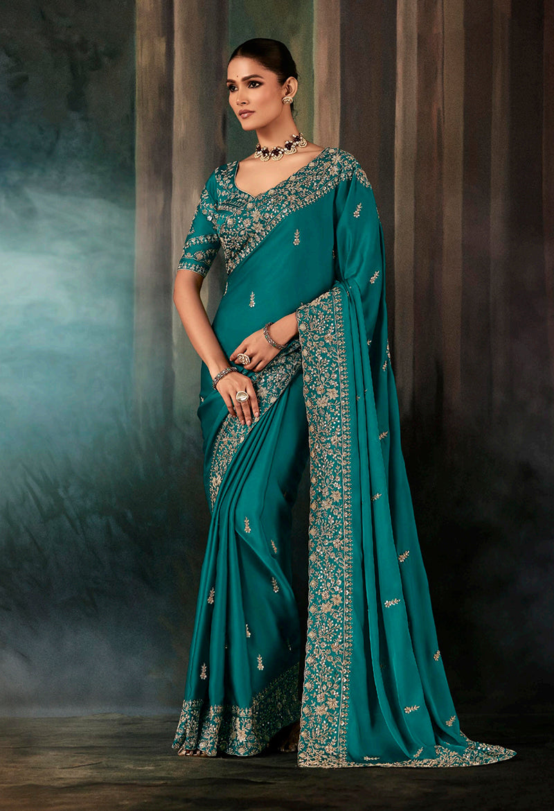 Monjolika Fashion Teal Faux Satin Embroidery Bridal Reception Festival Wedding Wear Heavy Border Saree