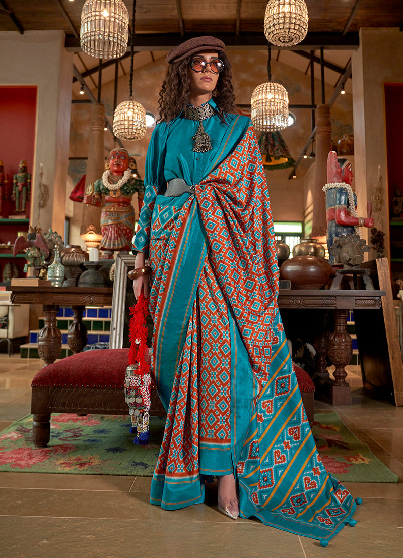 Monjolika Fashion Aqua Blue and Rust Silk Blend Ikat Print Work Contemporary Saree