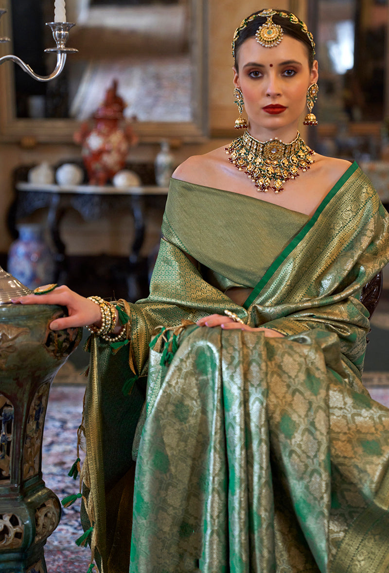 Monjolika Fashion Kanjivaram Silk Blend Classic Saree with Woven Work for Women in Green